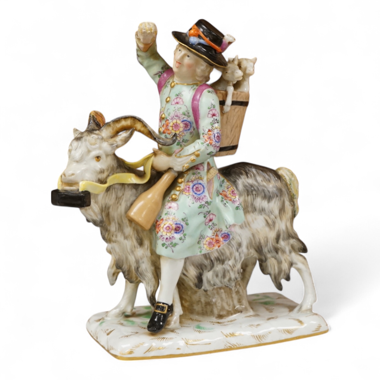 A 19th century German porcelain group of Count Von Bruhl's Tailor, 19cm wide